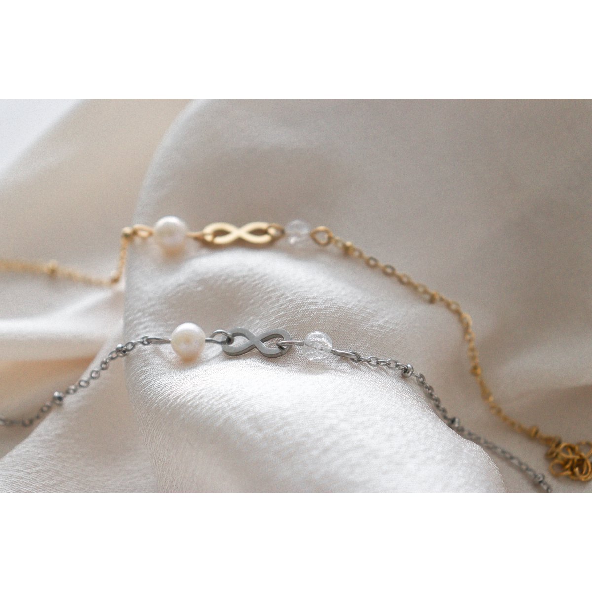 Infinity & Parel Armband - Goud