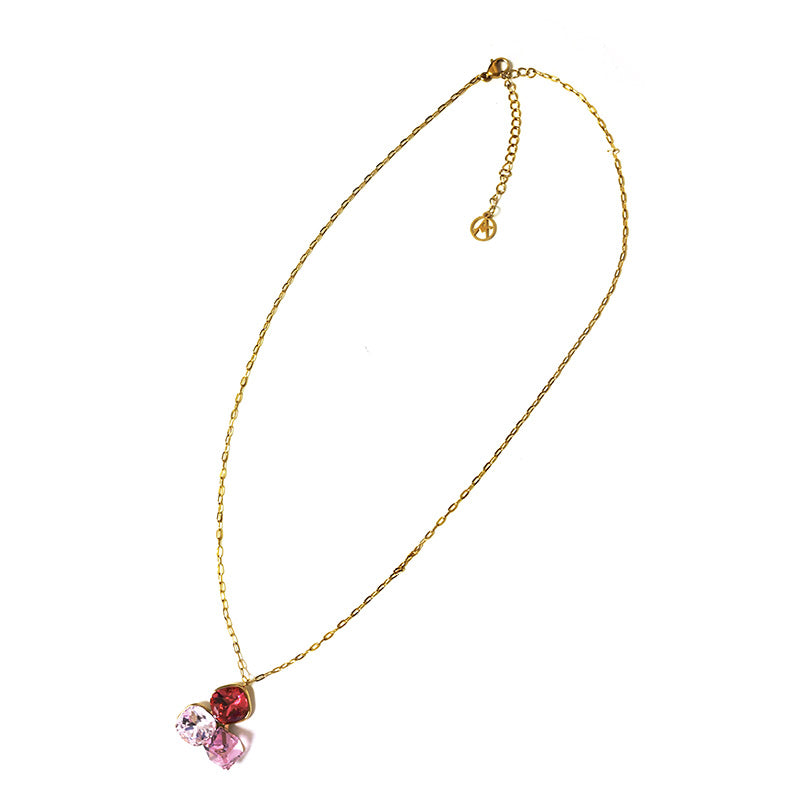 Ketting met drie kristallen hanger - goud