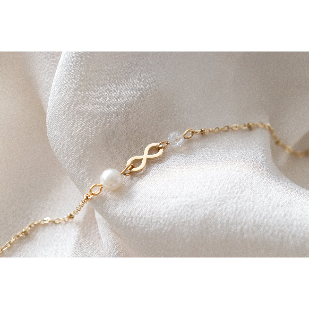 Infinity & Parel Armband - Goud
